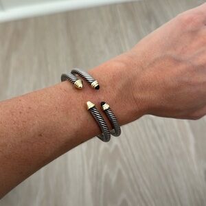 Classic Cable Bracelet
Sterling Silver with 14K Yellow Gold Domes, 4mm